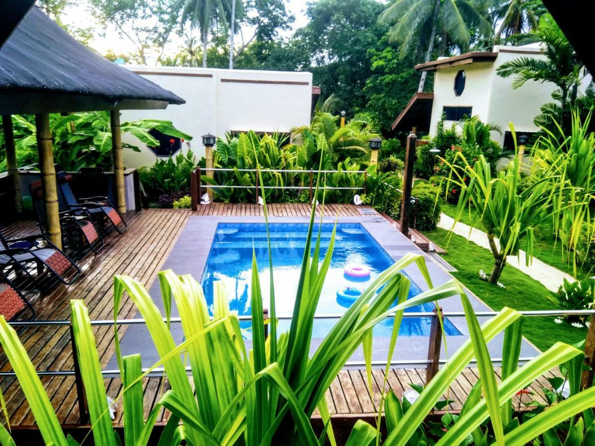 Siargao Sunset Bay Beach Villas Генерал-Луна Экстерьер фото